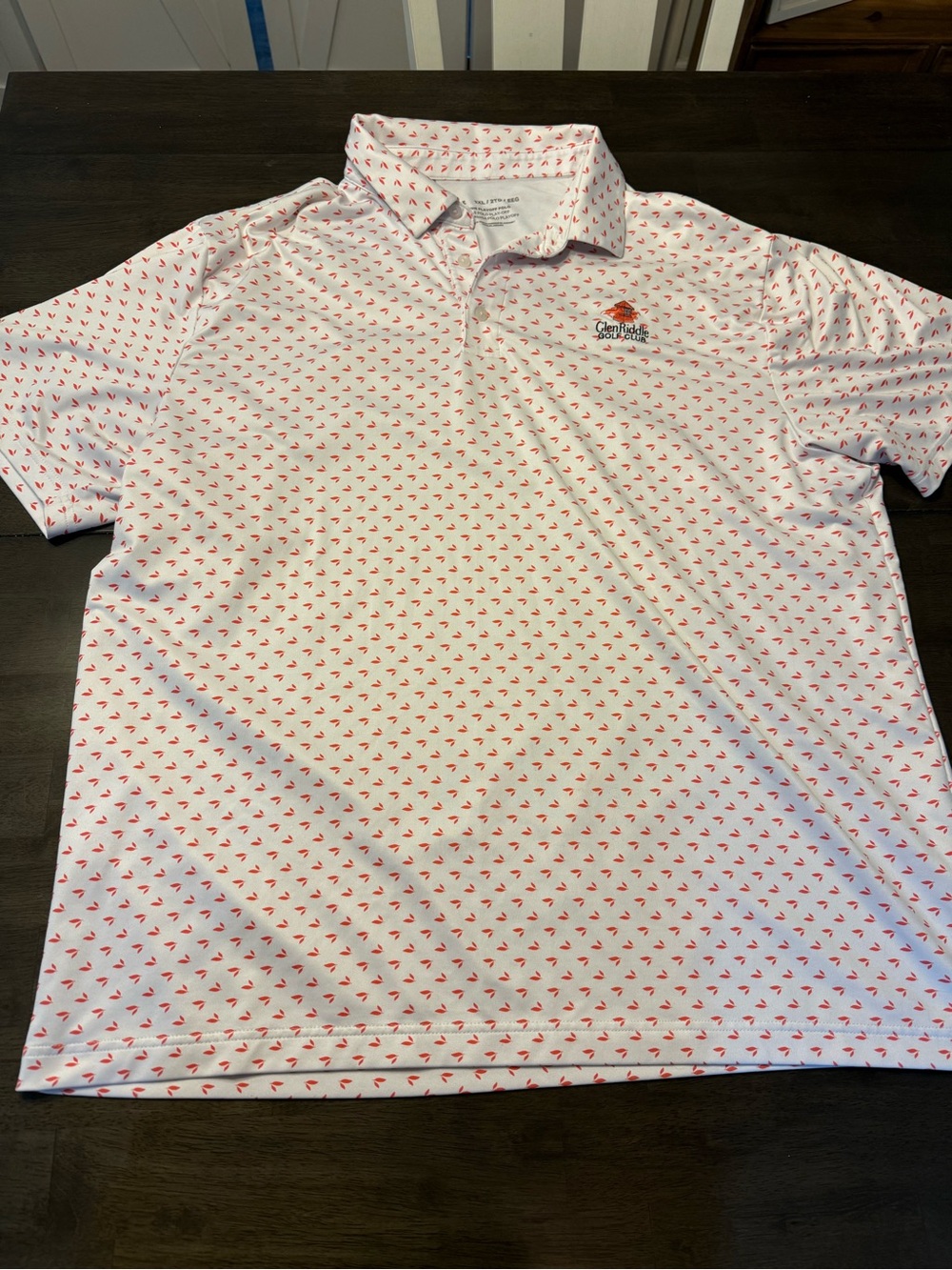 Under Armour White Polo with orange Micro Pattern Glen Riddle golf club